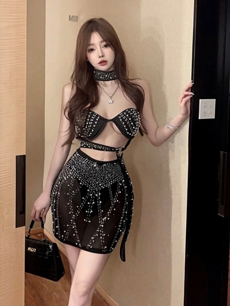 Nuovo abito sexy in maglia di lusso con strass senza maniche stile di fascia alta Abito sexy in prospettiva a vita scoperta da donna