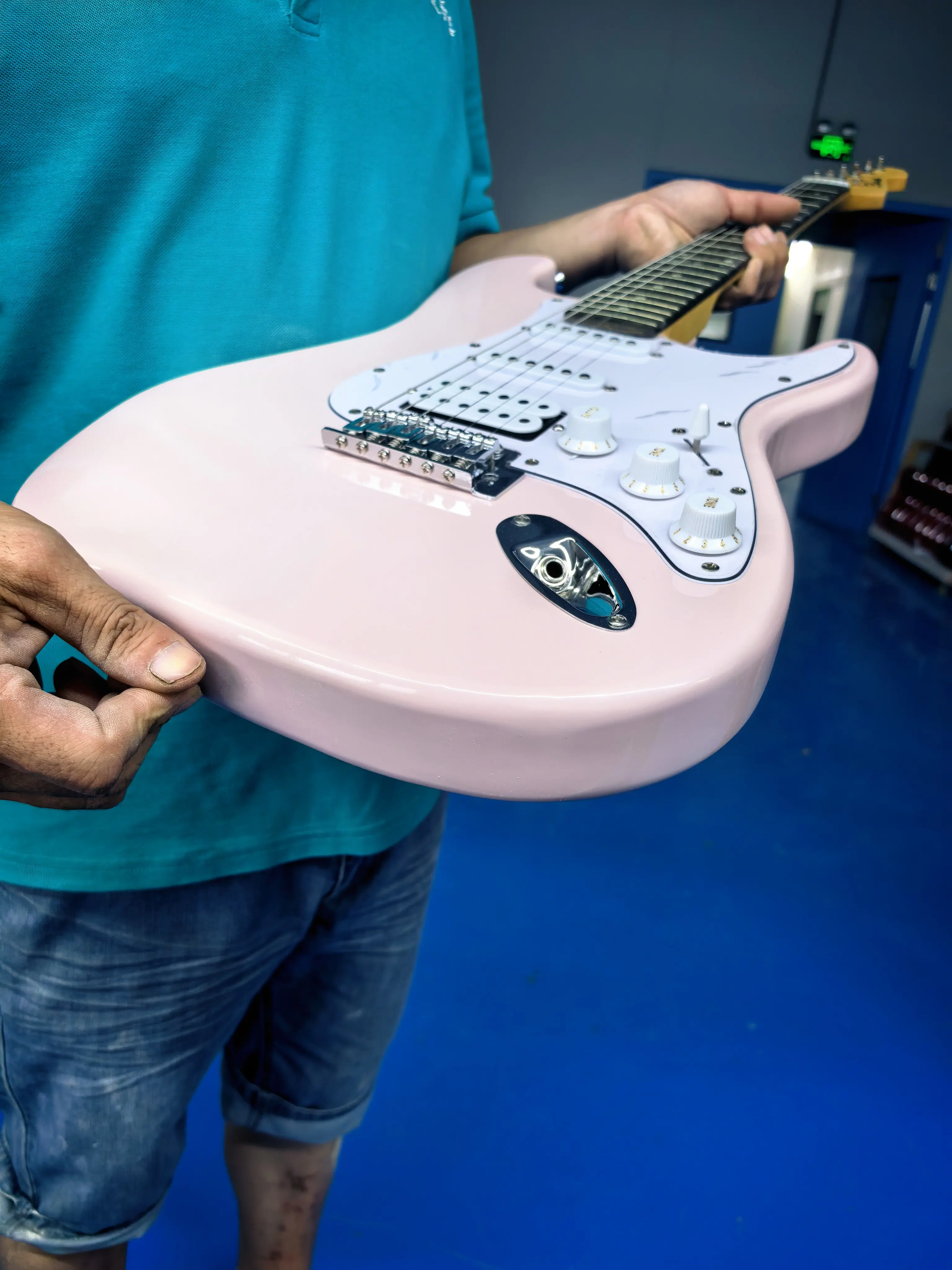 Tailpiece: Pink 6-string electric guitar, equipped with single and double pickups, customizable