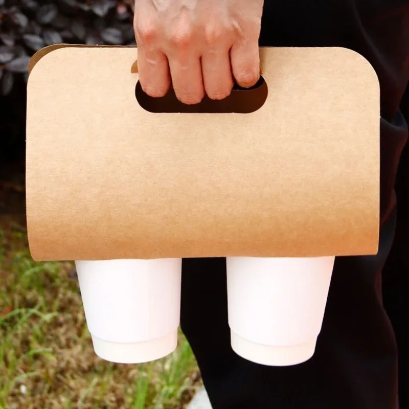 50pcs Handheld Cup Holder Disposable Paper Cup Holders Milk Tea Soybean Milk Plastic Cup Take Away Packing Rack  Party Supplies