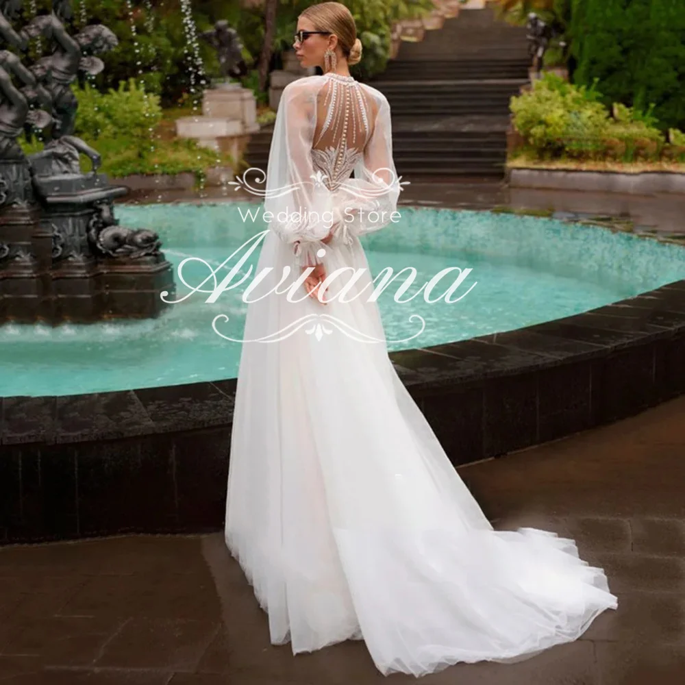 

Aviana Customized High Neck Long Puff Sleeve Appliques Embellished Tulle Wedding Dress with High Side Slitp Elegant Party Dress