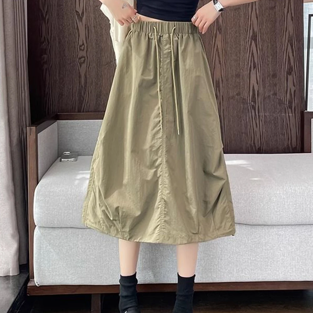 Mountain outdoor wind tooling elastic waist literary design sense pleated A-shaped skirt thin design sense skirt casual