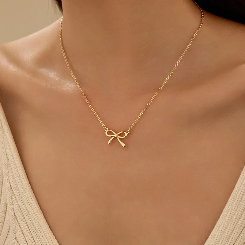 قلادة أنيقة على شكل فيونكة على شكل عقدة على شكل فيونكة مناسبة لعيد الحب وحفلات الزفاف والحفلات ومجوهرات الارتداء اليومي