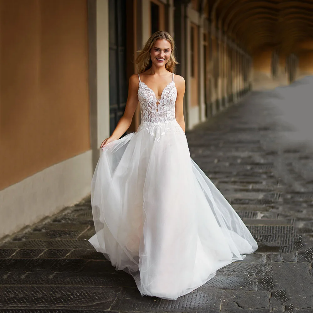 

Elegant Boho A-line Wedding Dresses 2025 V Neck Bihemian Brides Dress Lace Appliques Backless Luxury Bridal Dress Customized