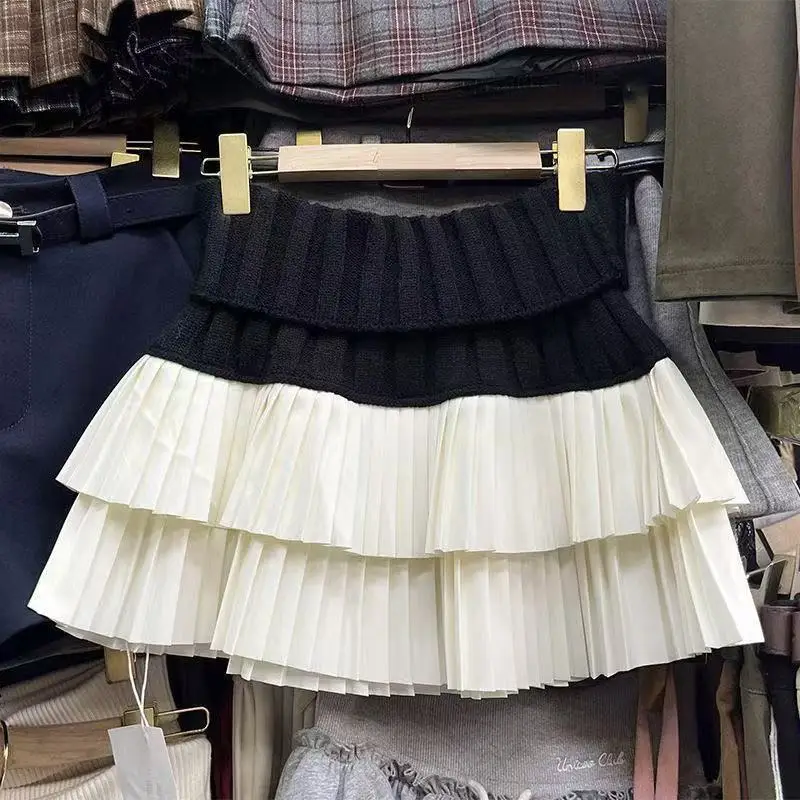 Menina quente emendado saia curta outono e inverno nova cintura elástica a linha de cintura alta bolo saia plissada saia pequena