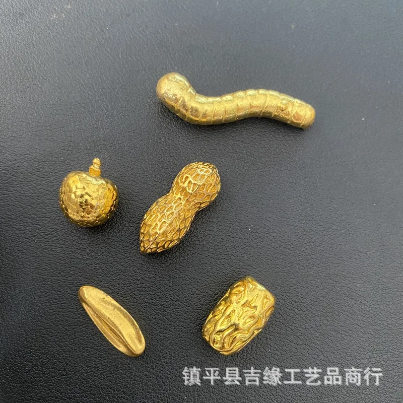 Antique golden solid melon seed ornaments for home and office, gift items, decorative pieces, golden peanut-shaped desktop fruit