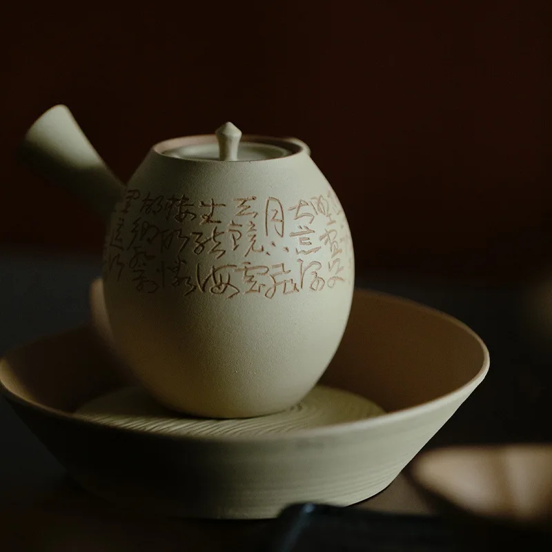 Hand-Carved Zisha Clay Teapot With Inscriptions From The Book Of Songs Featuring A Sparrow Motif Side-Handle Design