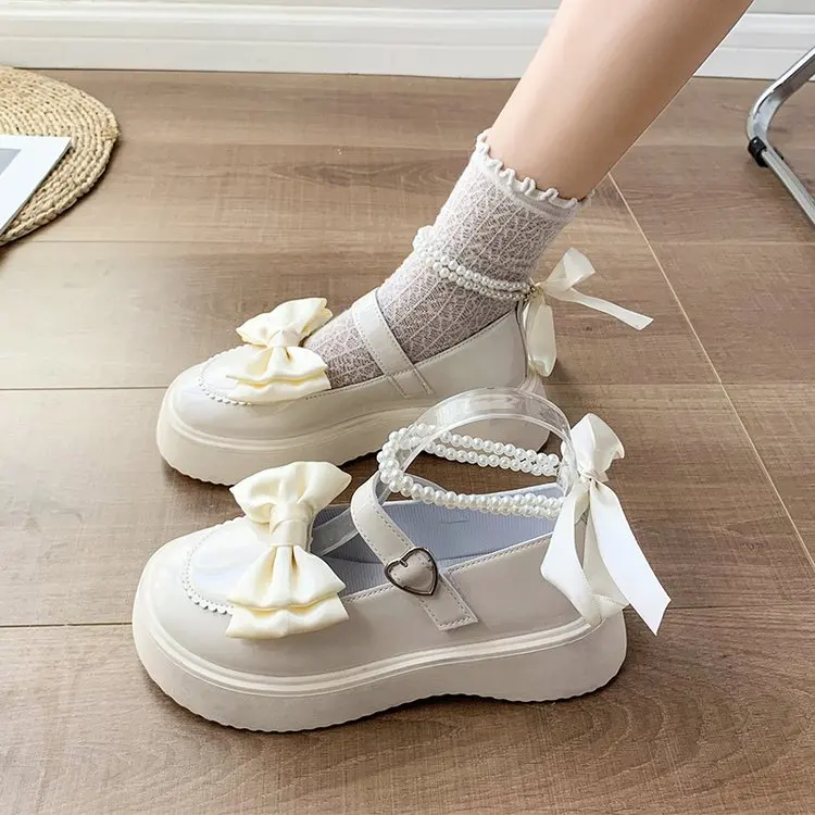 New Sweet Bowknot Lolita Shoes Women Heart Buckle Patent Leather Mary Janes Woman Round Toe Platform Flats Shoes 2023