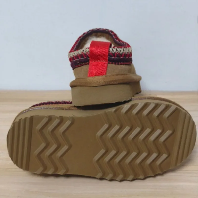 รองเท้าเด็กฤดูหนาว 2026 รุ่นใหม่ รองเท้าบูทหิมะเด็กบุขนหนานุ่ม กันลื่น รองเท้าเด็กหุ้มข้อสั้น รองเท้าผ้าฝ้ายสำหรับหิมะ ไซส์ 21-35