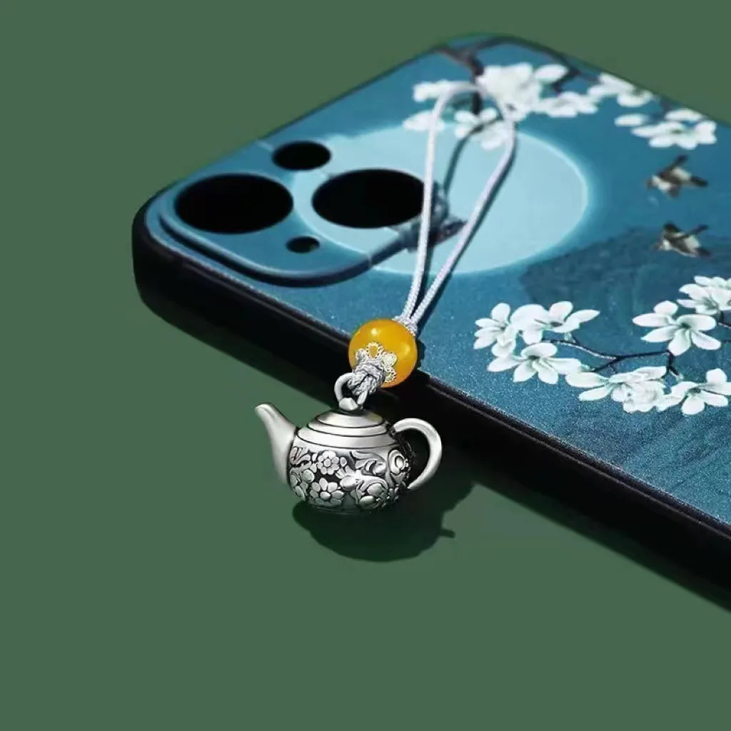 Simple flower tea pot mobile key pendant, niche design artistic style fashion trend boutique, suitable for both men and women.