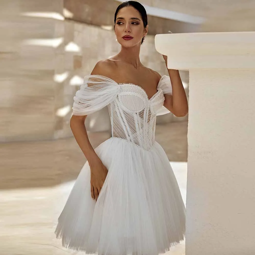 

Современные женские платья, тренд 2025, тюлевые платья трапециевидной формы для свадебной вечеринки, белое свадебное платье с открытыми плечами и жемчугом, рюшами в виде рыбьей кости