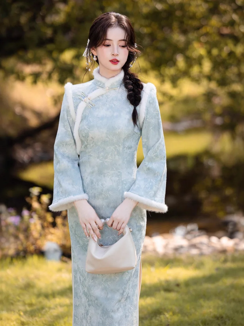 شيونغسام طويل سميك جديد لشتاء 2025 بأكمام كبيرة مقلوبة وياقة واقفة بقصة ضيقة من تشيباو