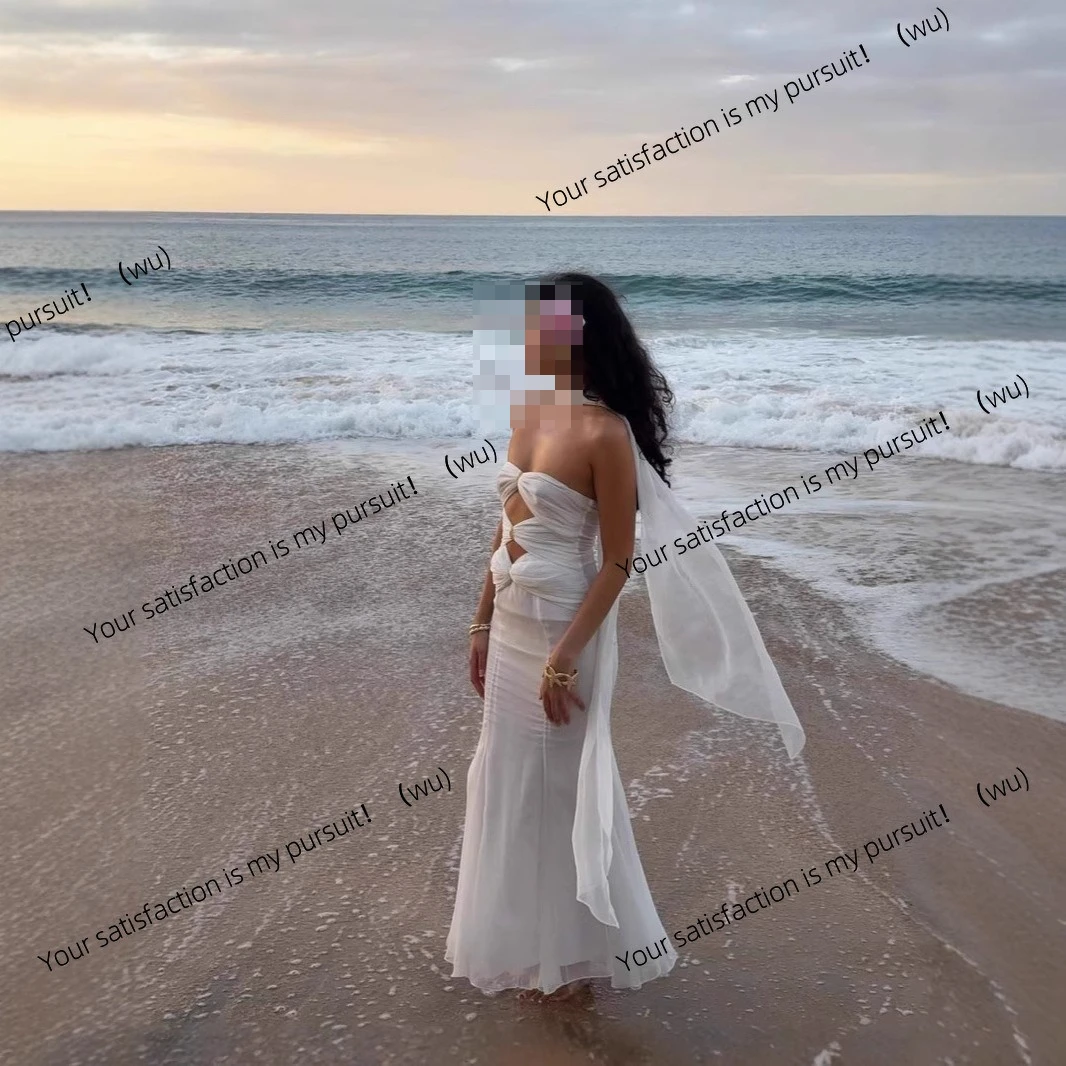 Gaun pesta wanita model tube top panjang dengan desain berongga multi-knot, gaya romantis dan sensual.