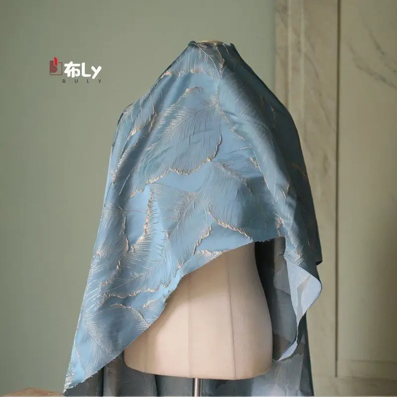 

Golden silk leaves high-precision lifting pattern relief living room home curtain cloth study cheongsam clothing designer fabric