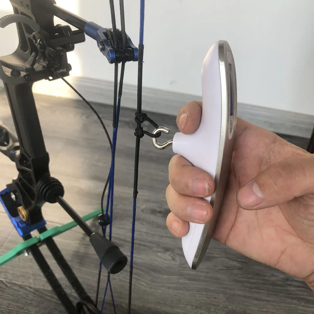 

Электронные цифровые весы-безмены серебристого цвета для измерения веса стрел для рекурсивных и блочных луков