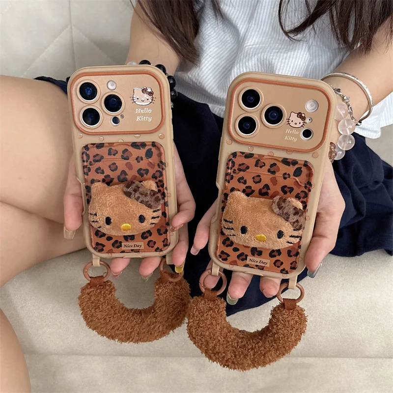 

Fashion Brown Leopard Print Hellokitty Card Slot Phone Case For iPhone 17 Pro 16 15 14 Pro Max Cover with Plush Hand Strap Cute