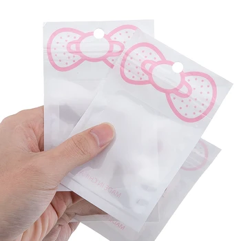 50pcs 귀여운 핑크 활 매듭 가방 DIY 쥬얼리 소매 포장 및 디스플레이 파티 호의 선물 가방에 대 한 Resealable 8x12cm 지퍼 가방