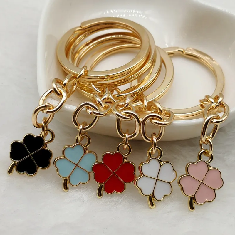 Creative multi-color enamel Four-leaf clover lucky key chain pendant bag accessories girl key chain Christmas gift sales