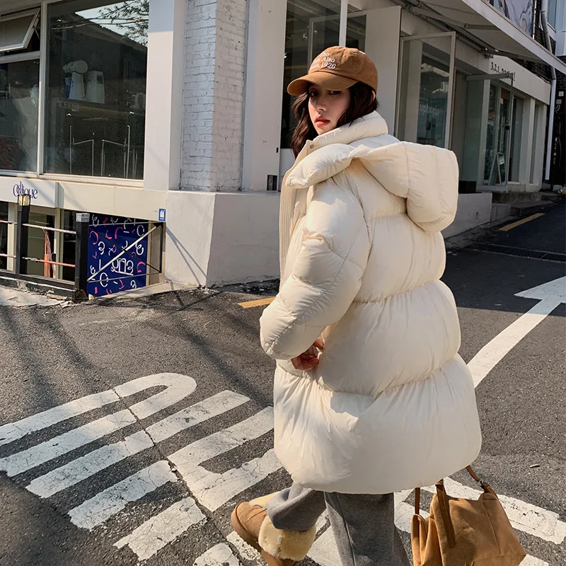 2025 moda inverno nova jaqueta feminina commuter à prova de vento com capuz pato branco para baixo jaqueta