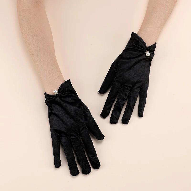 A pair of ElEGANT short bridal gloves suitable as accessories for women's weddings, festivals, and parties