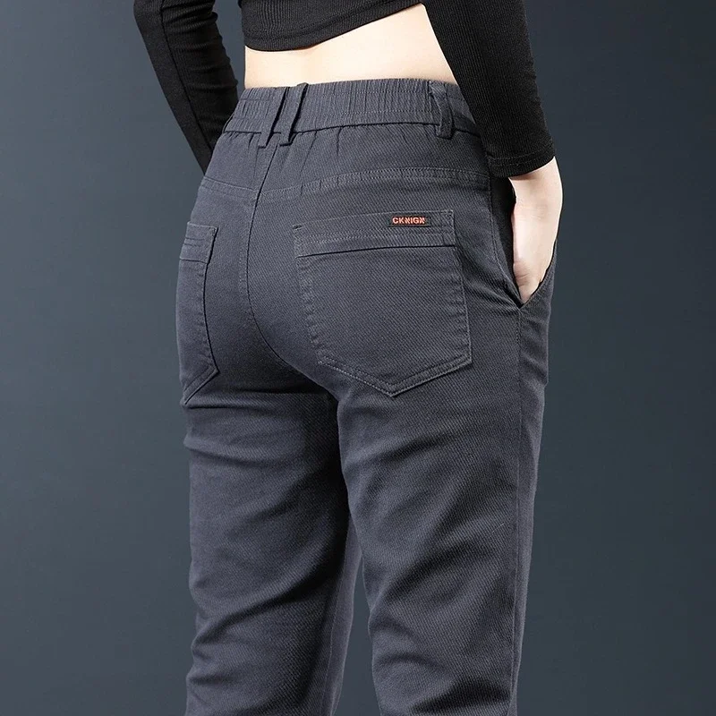 Pantalones informales de otoño a la moda con cintura elástica para hombre, pantalones rectos coreanos ajustados con pies pequeños, pantalones elásticos de Color sólido para ropa masculina