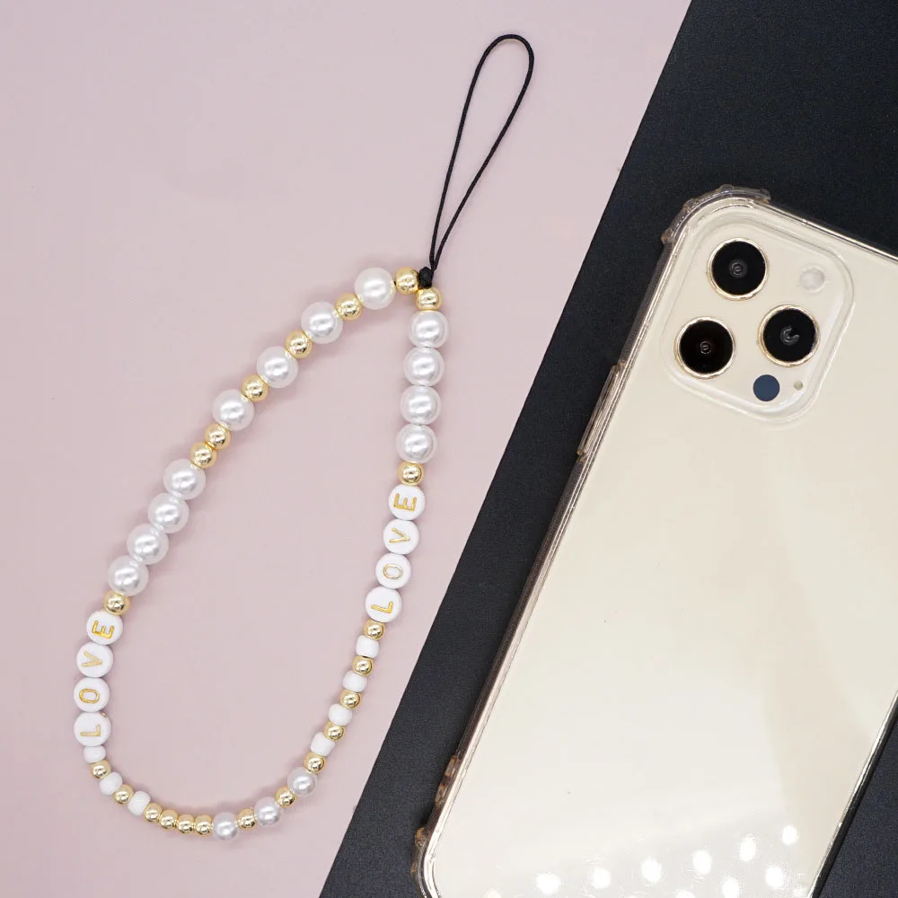 Trendy bohémien bianco imitazione perla perline rotonde lettere d'amore catena del telefono cellulare regalo di gioielli con cordino Anti-perso da donna