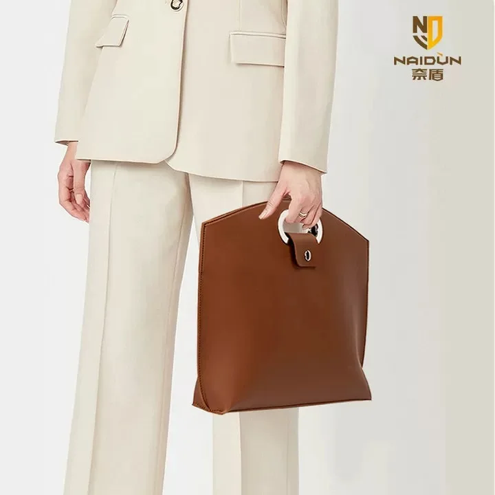 Notebook tablet handbag, leather material, large capacity easy-to-clean material