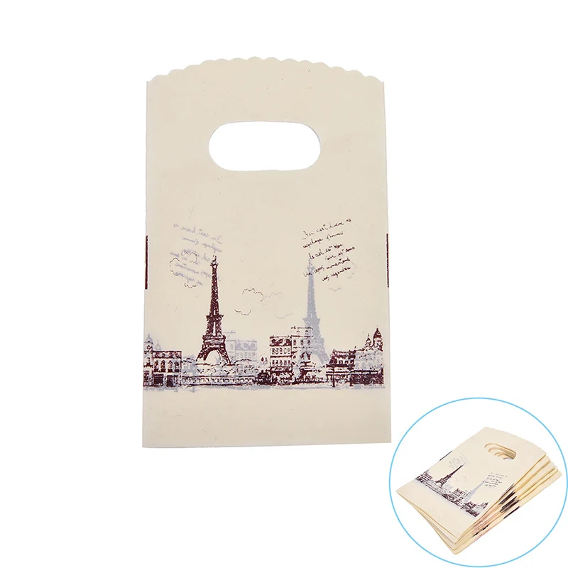 

100pcs/lot Eiffel Tower Mini Jewelry Plastic Gift Packaging Bags With Handles 2017 New Design Small Gift Bags 9x15cm