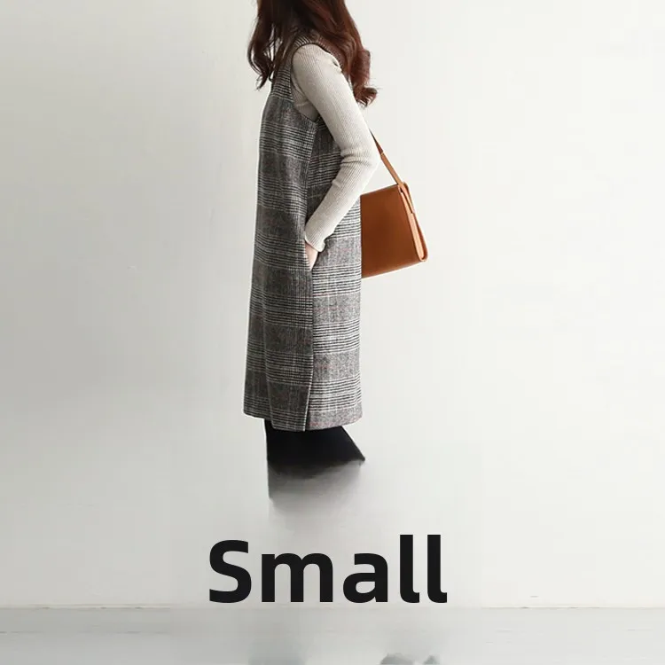 Wiosenna wełniana kamizelka w kratę Dr Slimming plus size z rozcięciem z boku, spódnica midi Dr o artystycznym kroju do pracy.