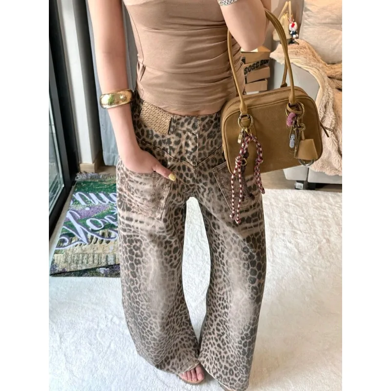 

Новые женские джинсы-клеш с широкими штанинами и изогнутым низом, осенняя мужская коллекция, нишевый дизайн, джинсовые брюки с леопардовым принтом