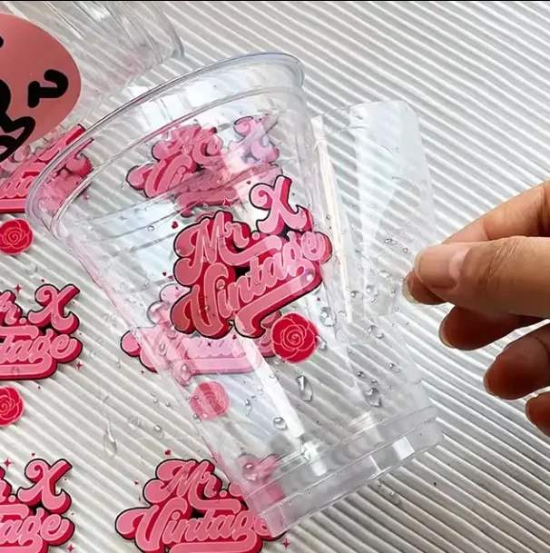 

Customized durable waterproof self-adhesive UV transfer printing sticker 3D logo label cosmetic bottle cup sticker