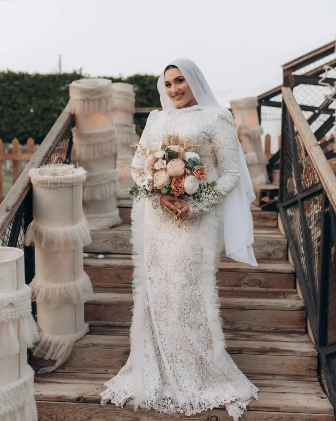 Abiti da sposa Boho caftano musulmano a sirena Abiti da sposa in pizzo all'uncinetto con volant a maniche lunghe Medio Oriente Hijab Abito da sposa personalizzato