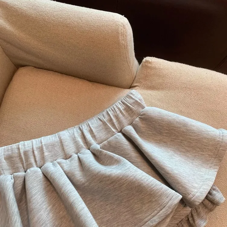 夏の新しいスパイシーガール弾性ローウエスト A ラインショートスカートグレー巾着スカート女性のための