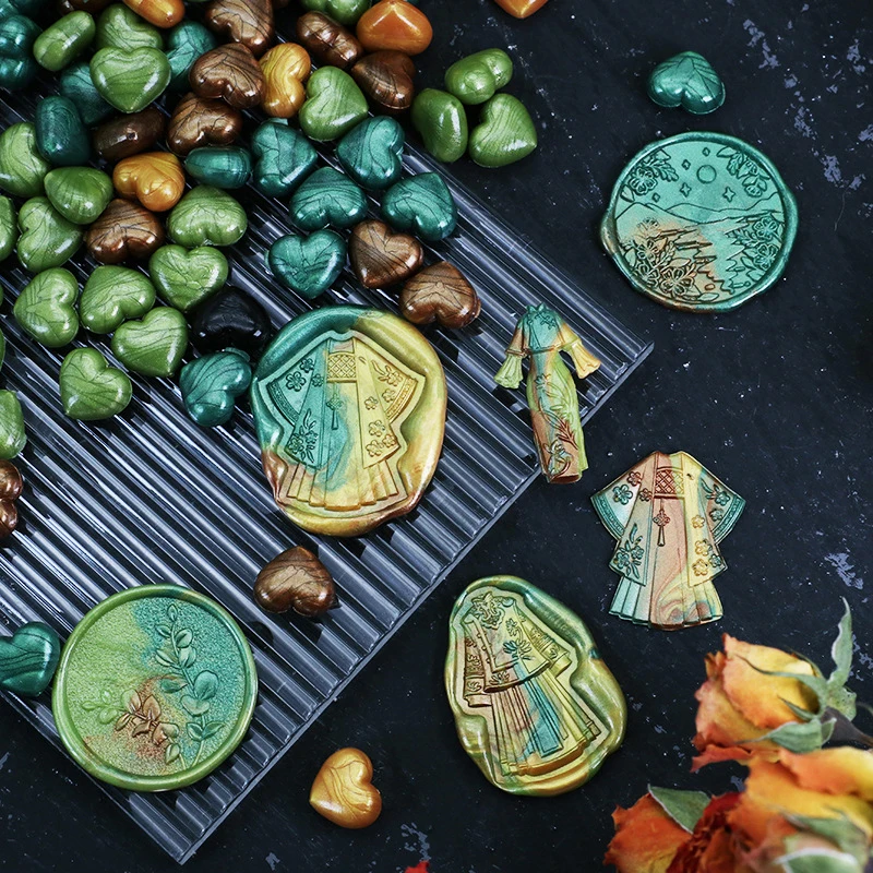 100 sztuk/worek w kształcie serca pieczęć woskowa pieczątki farby ogniowe pieczątki ziarna woskowe cząstki do koperty zaproszenie na ślub album do