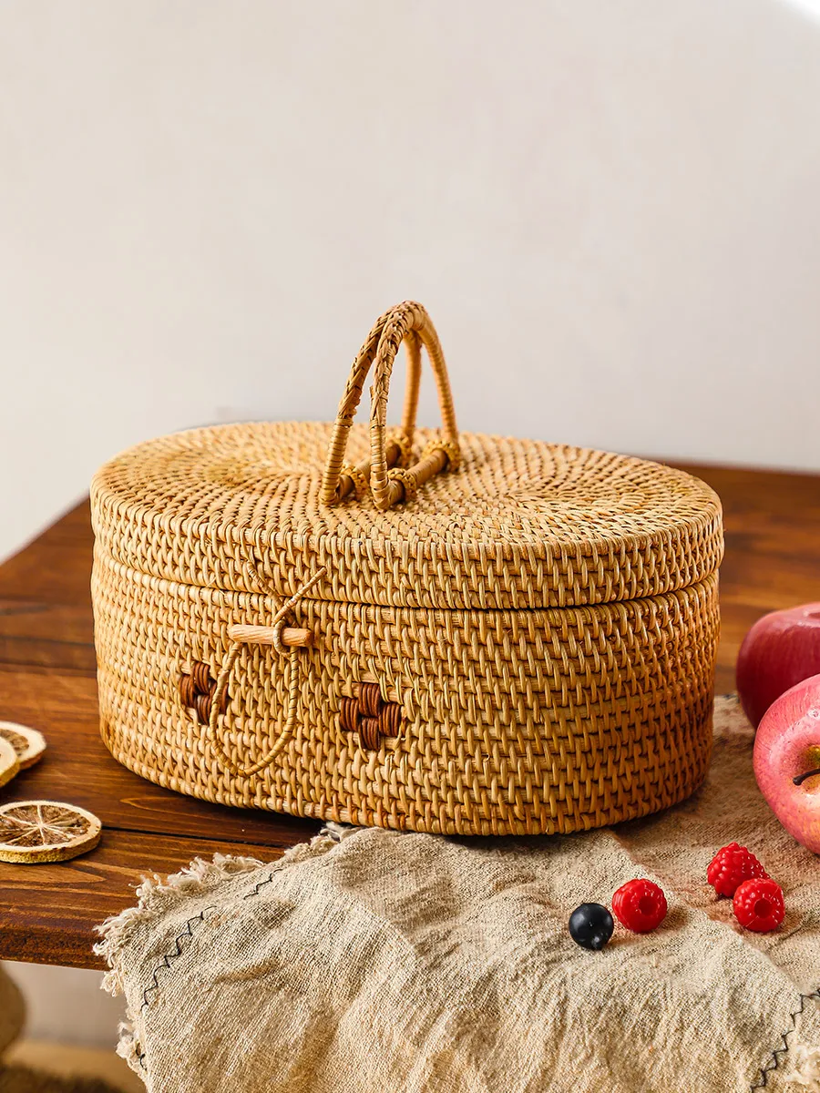 

Yili Viet Nam rattan ins picnic basket fruit bread basket desktop sundries storage box portable storage basket with cover.