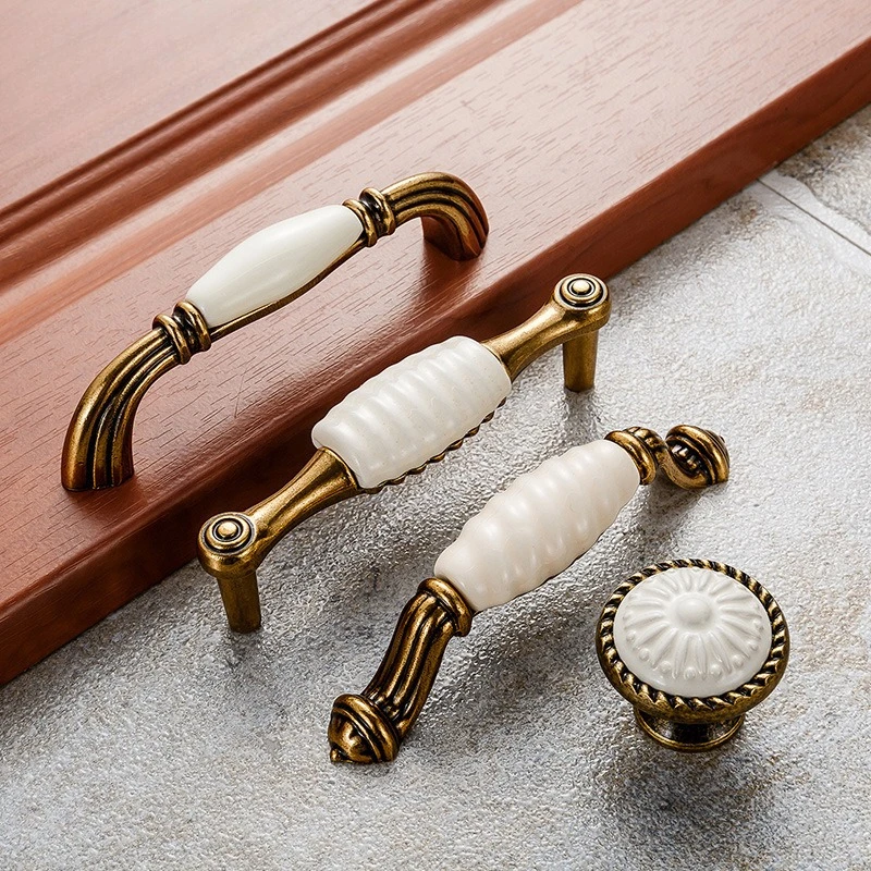 Perillas de cajón, manija de puerta de armario, herrajes para muebles europeos, manijas de gabinete blancas de cerámica de bronce antiguo de aleación de Zinc