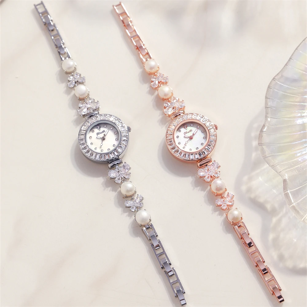 Personalized temperament women watch round diamond zircon four flower jade butterfly pearl silver strap night light quartz watch