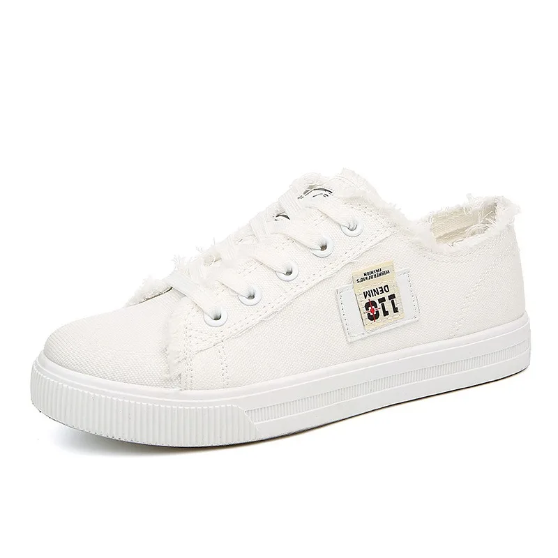 2023 nuove scarpe di tela da donna primavera estate Sneakers piatte scarpe Casual da donna scarpe bianche stringate con tomaia bassa