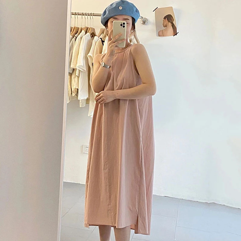 เสื้อกั๊กทรงหลวมสไตล์เกาหลีสีชมพูพาสเทล ดีไซน์เก๋ไก๋ พร้อมกระโปรงทรงเอ สไตล์ลำลอง ผ่าข้าง เหมาะสำหรับฤดูร้อน