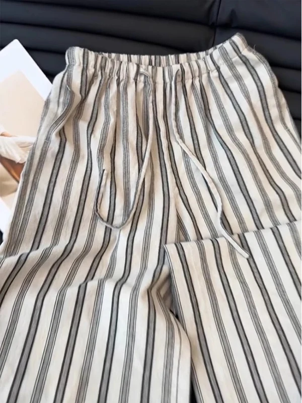 Spodnie damskie z wysokim stanem i szerokimi nogawkami, letnie, nowe, cienkie, luźne, wyszczuplające, codzienne spodnie, bawełniano-lniane, w paski, o prostym kroju, lato 2025.