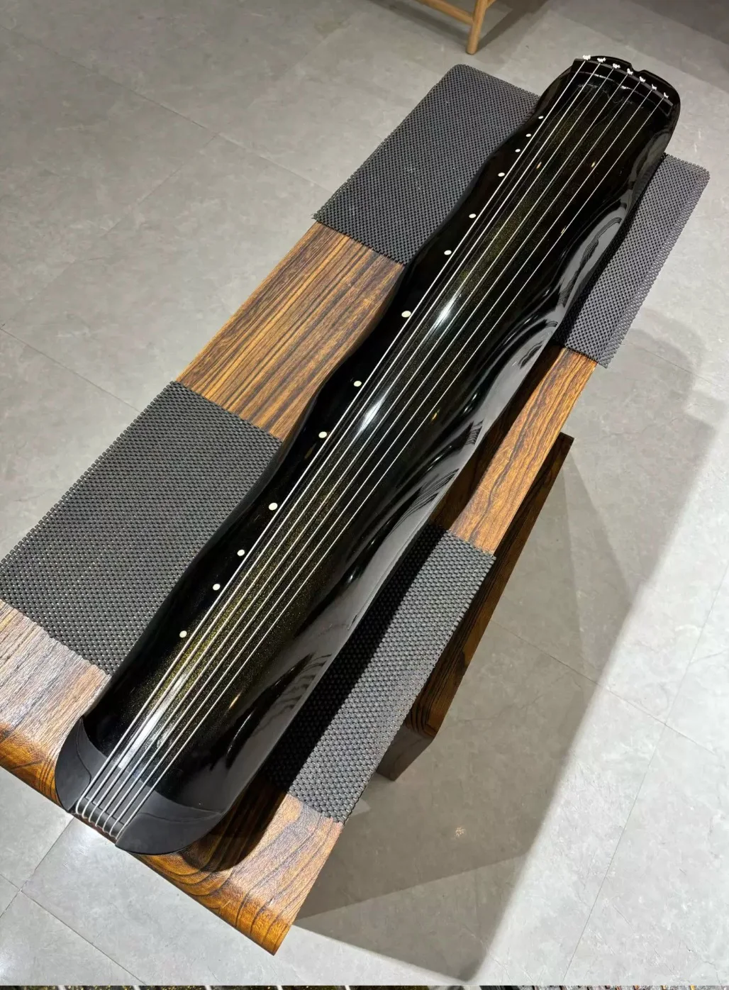 Chinese Guqin 7 String Zither Black Gold Jiaoye Shape Handcrafted Aged Cedar Raw Natural Lacquer Traditional Musical Instrument