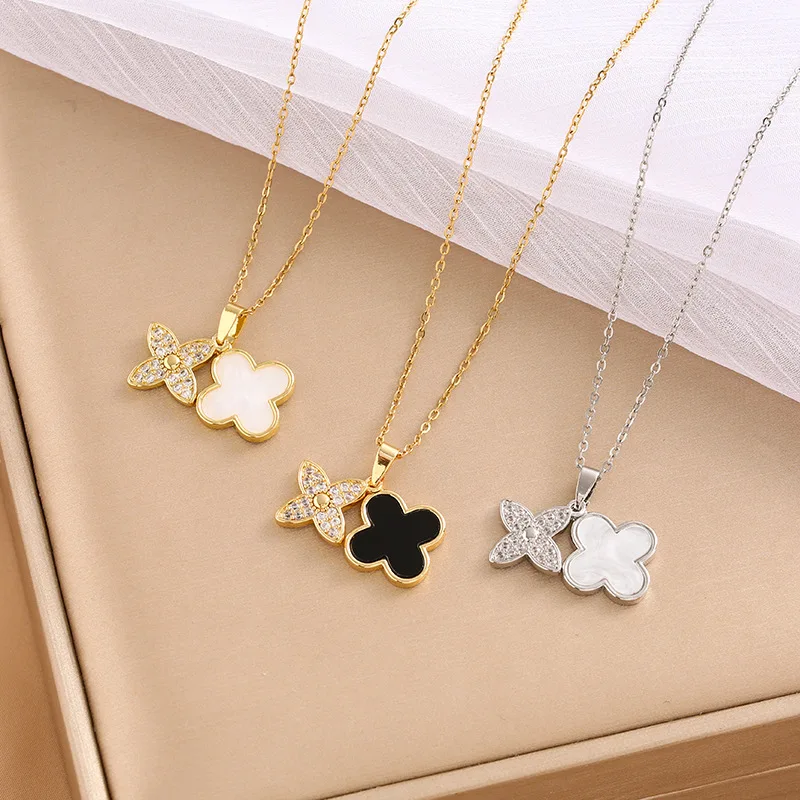 

Titanium steel four-leaf clover white diamond black and white shell chain light luxury and high-end InS-style necklace