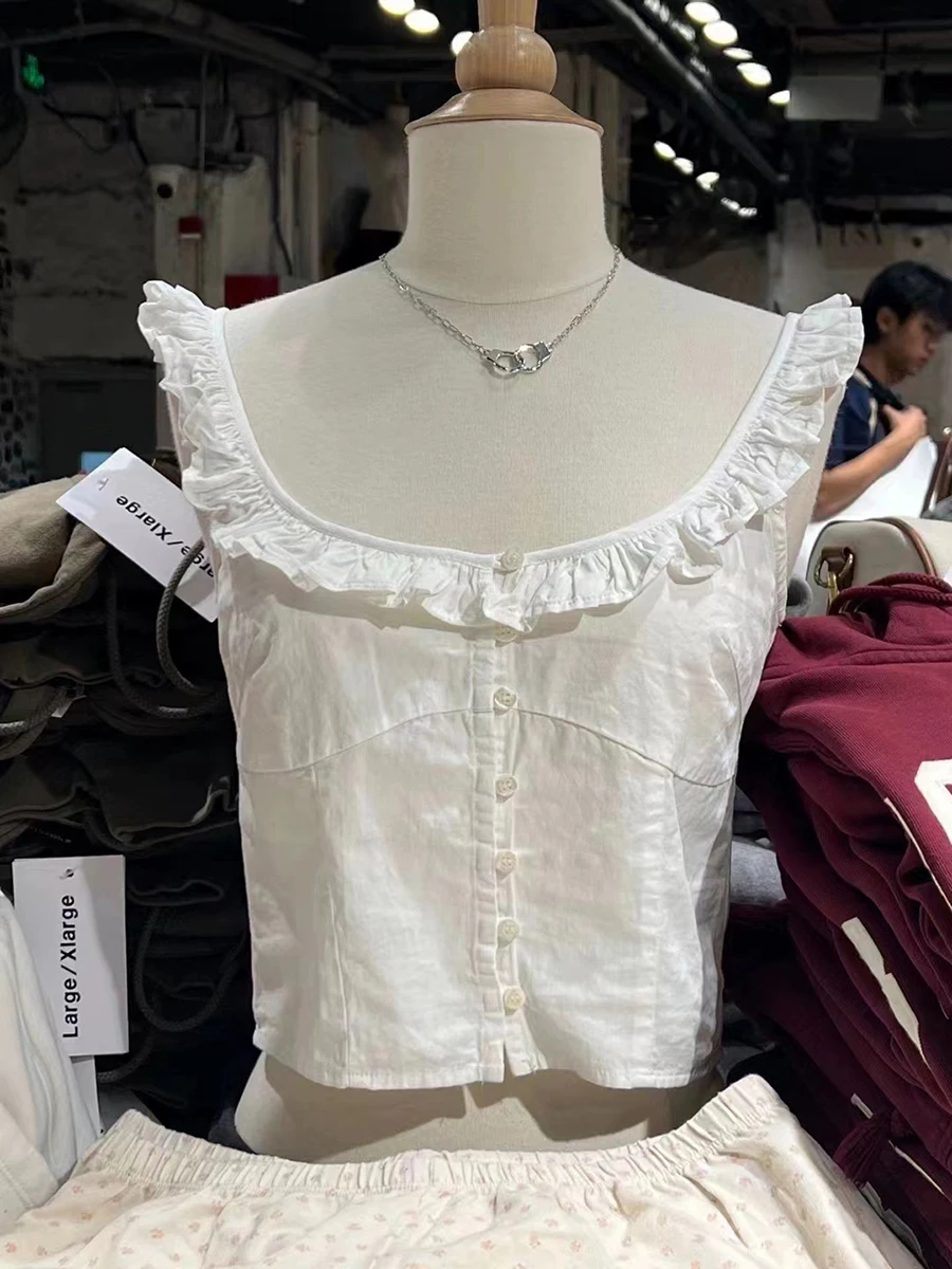 Dolce bianco volant bottoni Crop top donna estate cotone Scoop collo Preppy manica corta Tee Vintage Chic Slim carino t-shirt Y2K