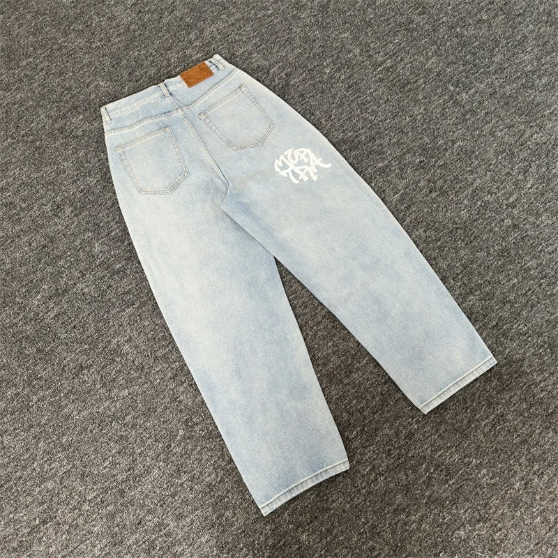 جينز Mertra أزرق مغسول لعام 2025 للرجال والنساء 1:1 أفضل جودة مطرزة بشعار عتيق مستقيم الساق من قماش الدنيم #1