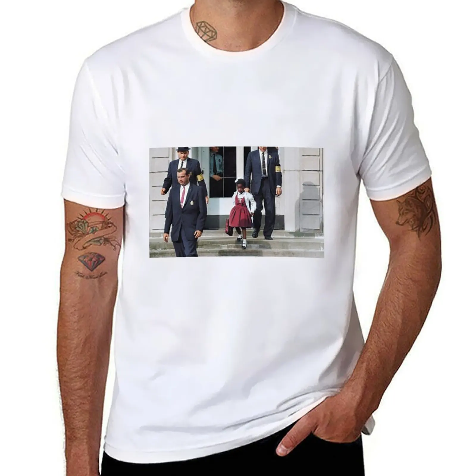 

Ruby Bridges, escorted by U.S. Marshals to attend an all-white school, 1960 T-Shirt man t shirt graphic T-Shirt