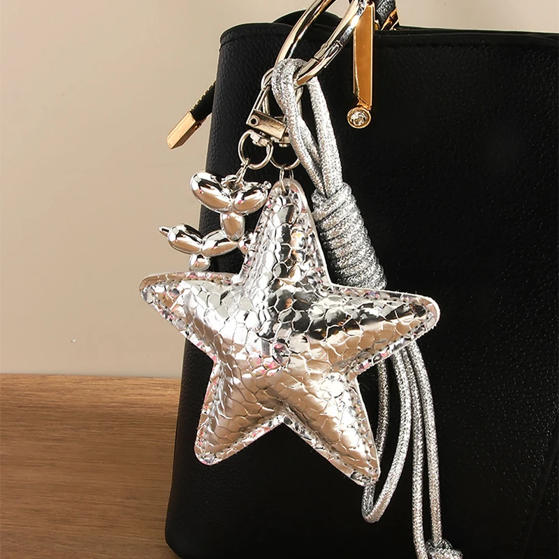 Miu نمط الخماسية نجمة الجلود القوس حقيبة سحر Y2K ليوبارد طباعة مطرز المفاتيح لطيف كيرينغ الإكسسوارات النساء محفظة الحلي