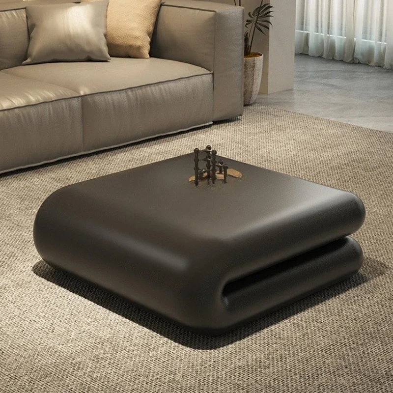 

Minimalist coffee table special-shaped black fiberglass, designer creative square book coffee table artistic sense