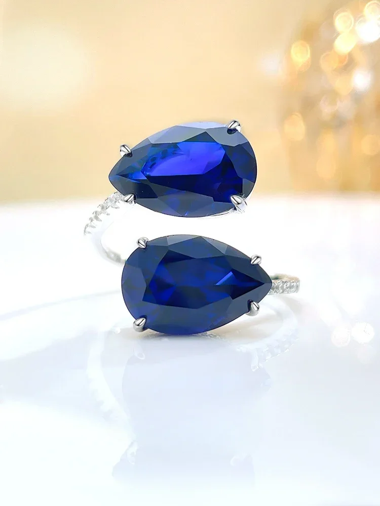 

Stylish and Minimalist Drop Opening Sapphire Blue 925 Silver Ring Set Paired with High Carbon Diamond Wedding