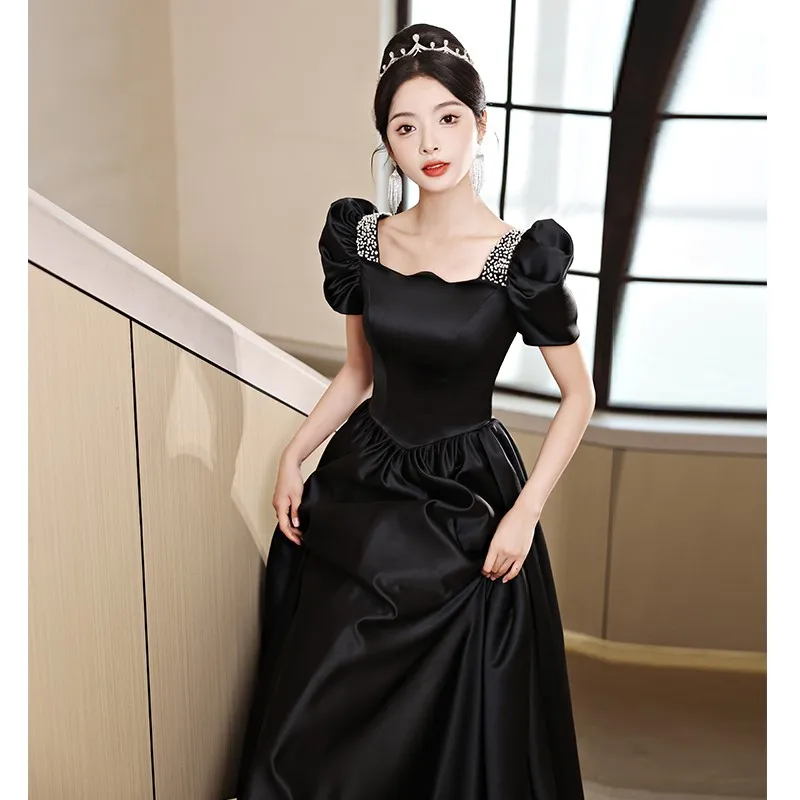 

Black female satin light luxury minority party quinceanera temperament presided over the exam dress