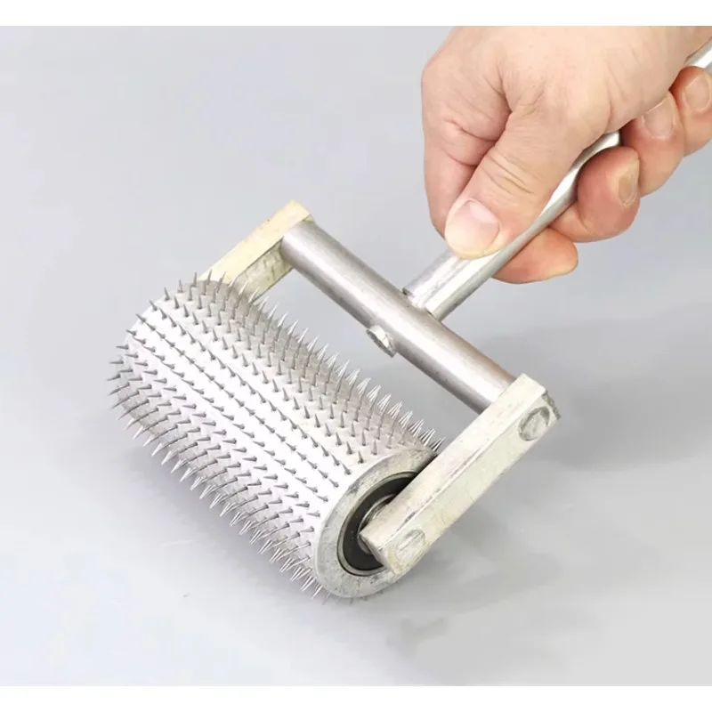 

Perforated needle roller perforated pinhole hand push roller barbed roller