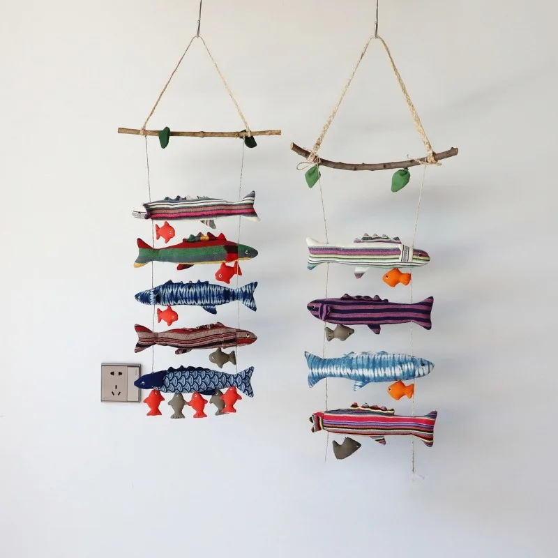 Buying Hall has fish wall hangings every year, fabric fish skewers, fabric fish wall hangings